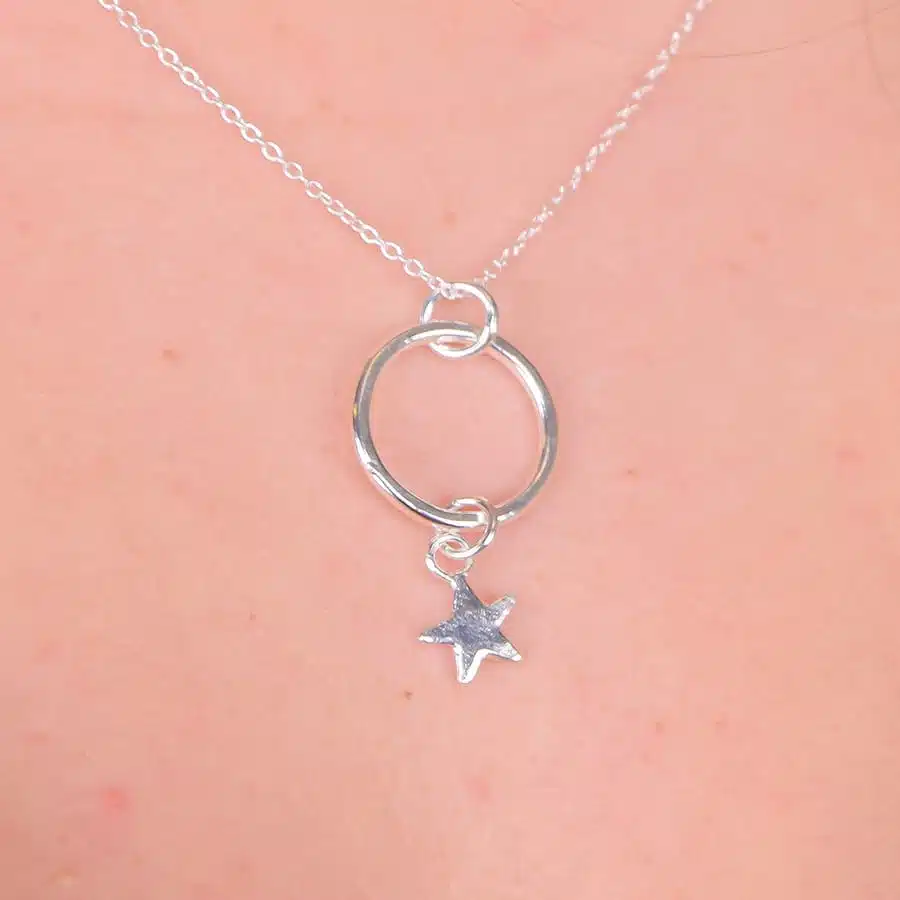 Beautifully simple circle necklace with a wee star